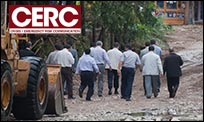 CERC design element over photo of men visiting disaster site