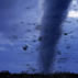 Photo of large tornado with debris.